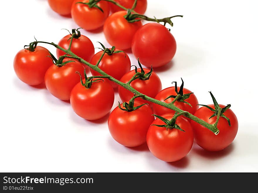 Fresh red tomato on white isolated