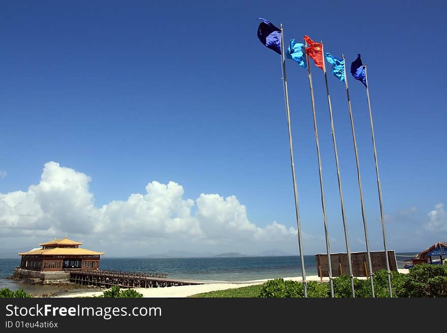 Flags with pavilion under a clear and azure sky. Flags with pavilion under a clear and azure sky