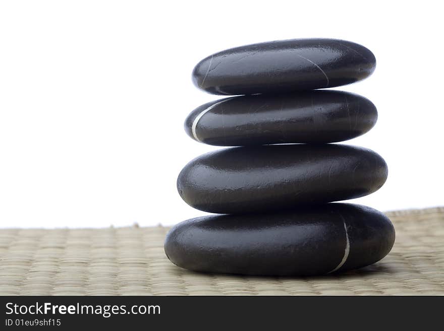 Stone tower on white background