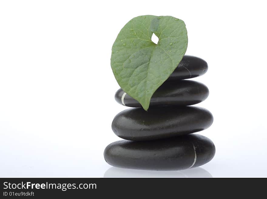 Stone tower on white background