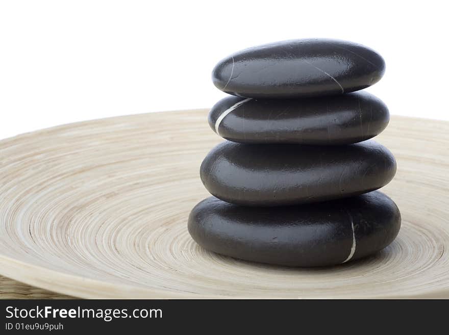 Stone tower on white background