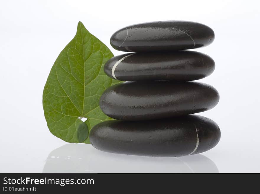 Stone tower on white background