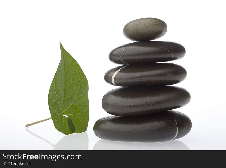 Stone tower on white background