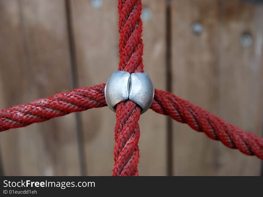 Ropes for children's playground in the woods on a board