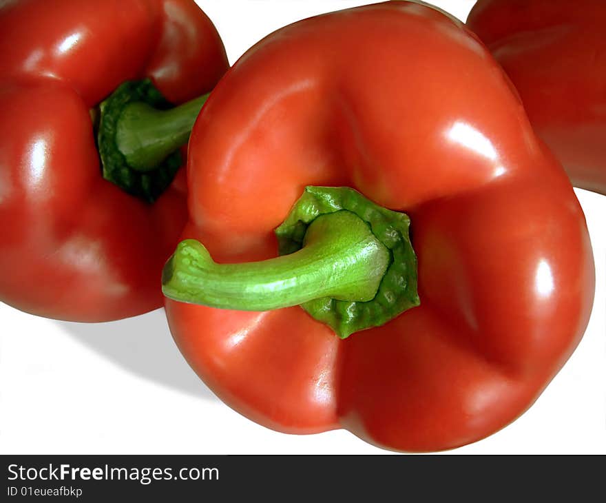 Juicy red pepper on white background. Juicy red pepper on white background.