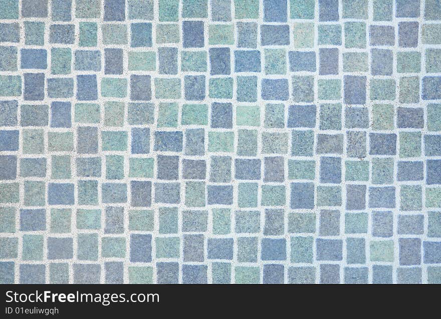 Blue mosaic tiles in a woven pattern, perfect to use as  a background. Blue mosaic tiles in a woven pattern, perfect to use as  a background