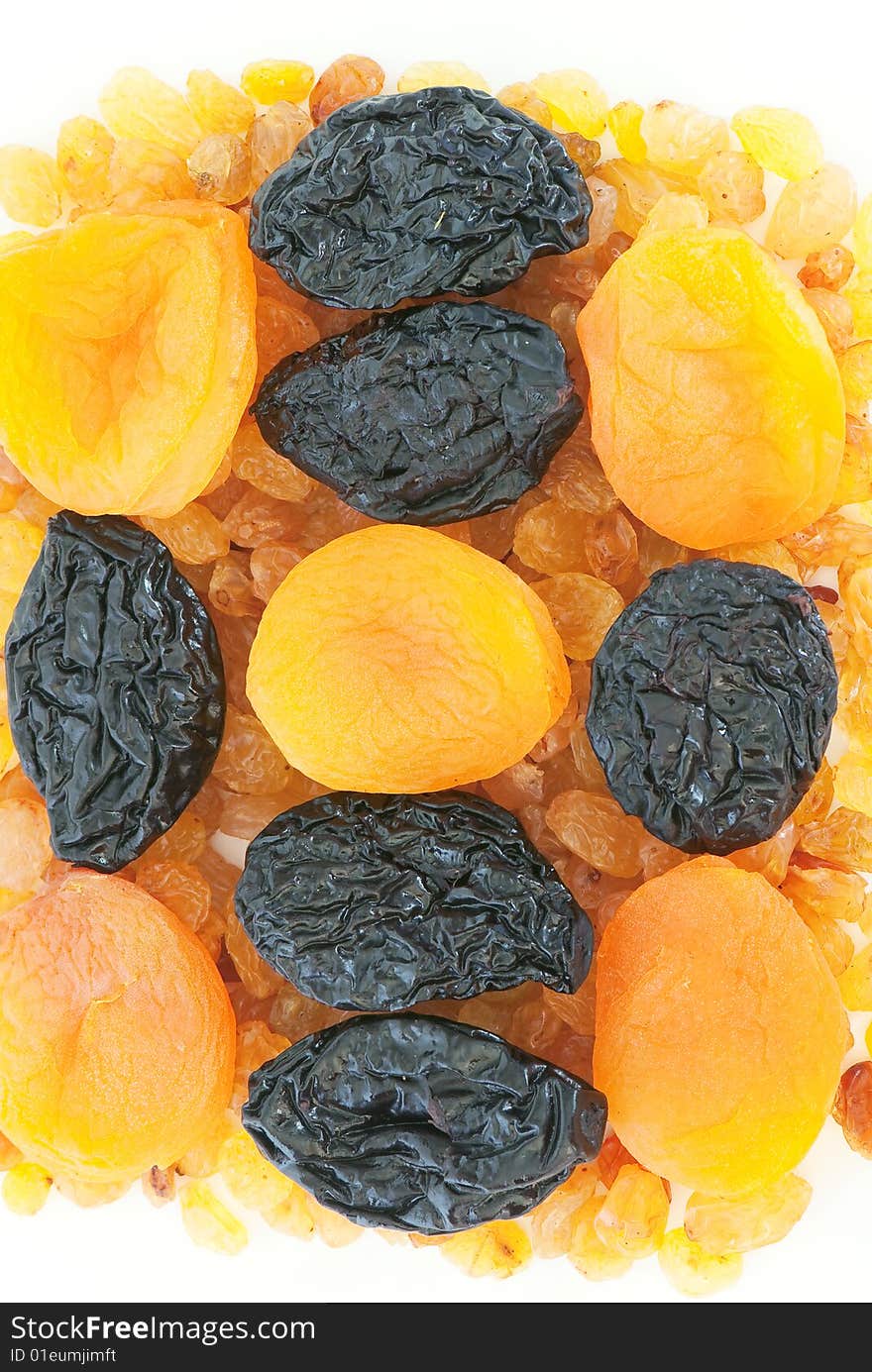 Composition from dried fruits on a light background