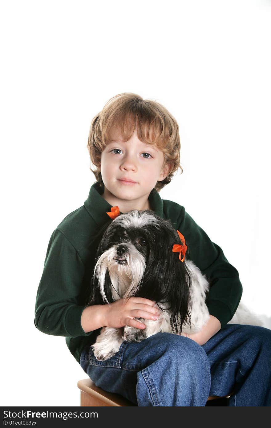 A boy and his shih szu dog. A boy and his shih szu dog