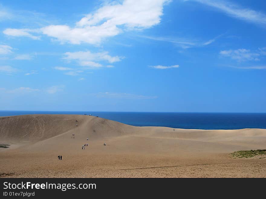 People walking in a desert. People walking in a desert