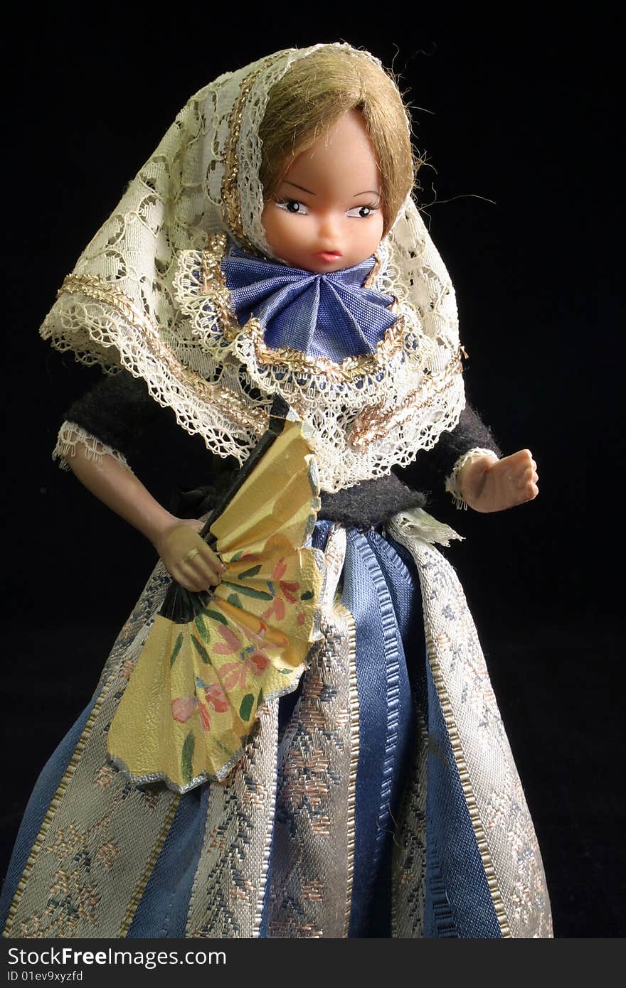 Doll holding fan