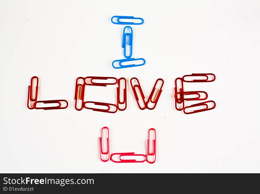 Paper clips arranged to say I Love U. Paper clips arranged to say I Love U