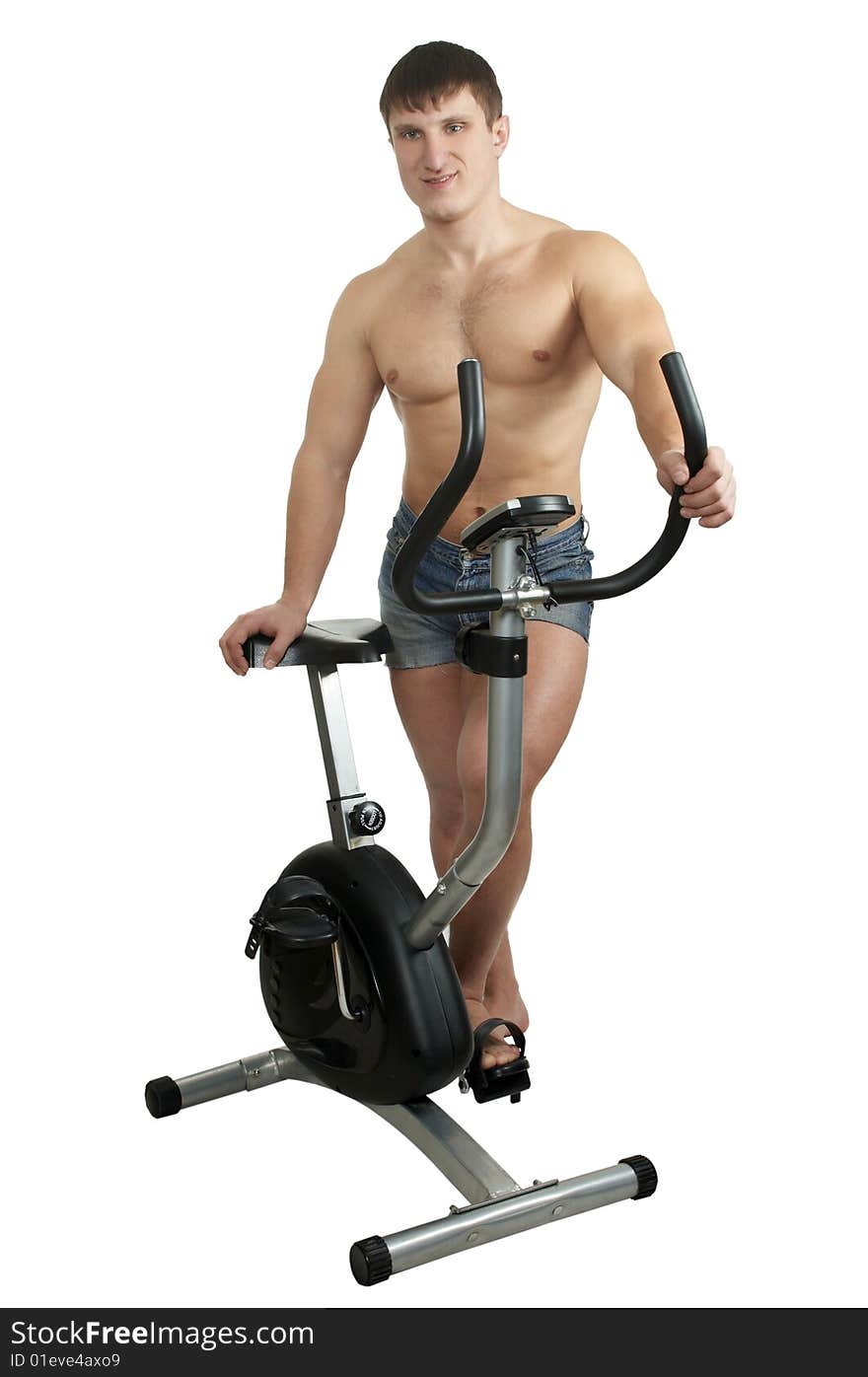 man and  exercise bicycle