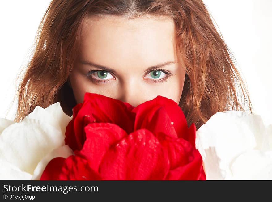 Young girl with large red flower