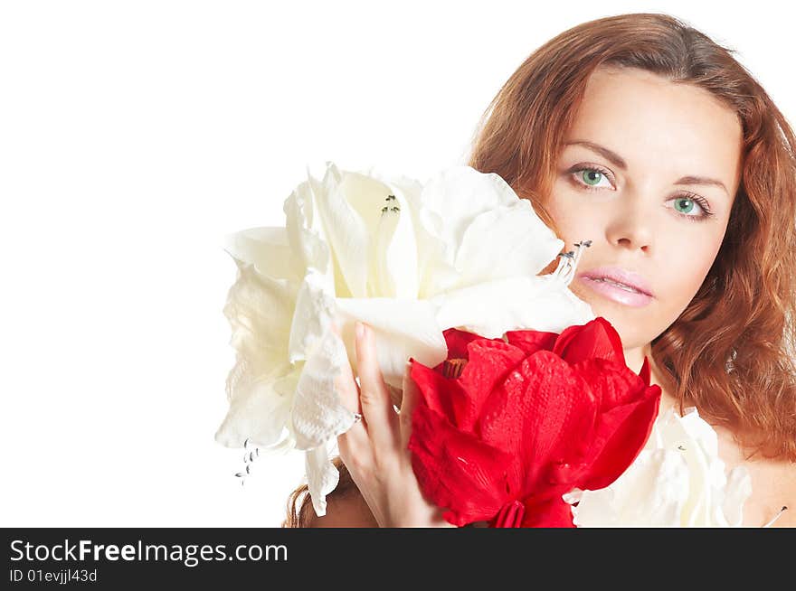 The attractive young girl with beautiful large flower. The attractive young girl with beautiful large flower