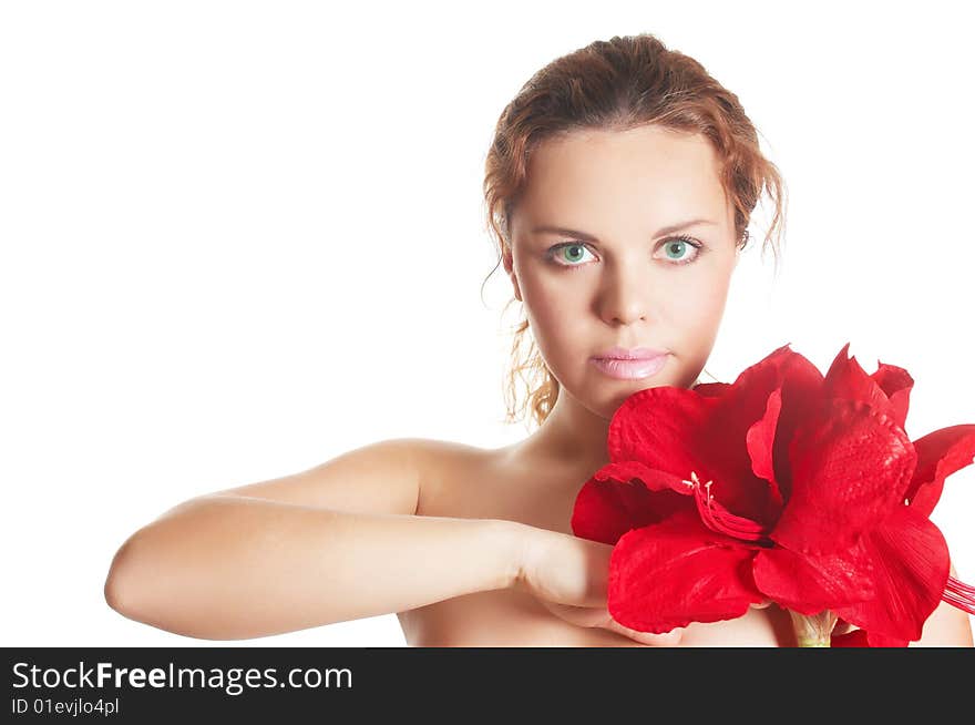 The attractive young girl with beautiful large flower. The attractive young girl with beautiful large flower