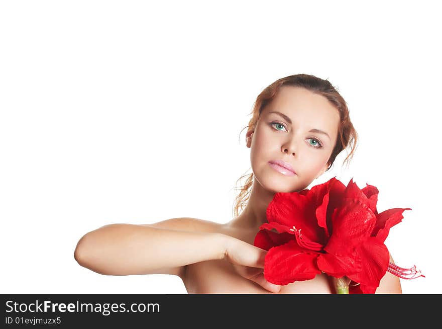 The attractive young girl with beautiful large flower. The attractive young girl with beautiful large flower