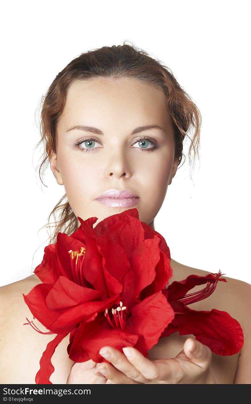 The attractive young girl with beautiful large flower. The attractive young girl with beautiful large flower