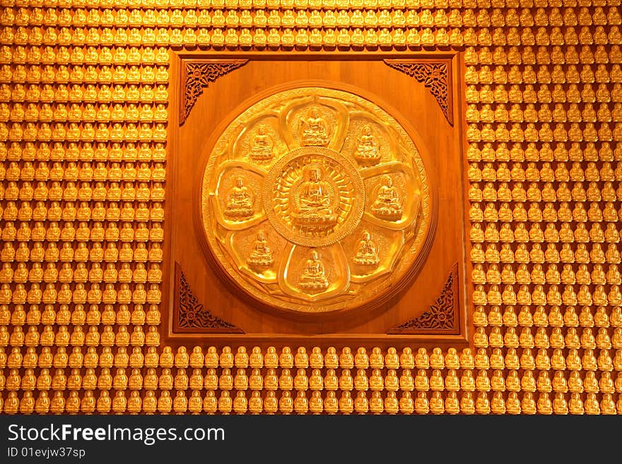 Thousand of Buddha images on the wall of pavilion in Chinese temple, Nonthaburi, Thailand. Thousand of Buddha images on the wall of pavilion in Chinese temple, Nonthaburi, Thailand.