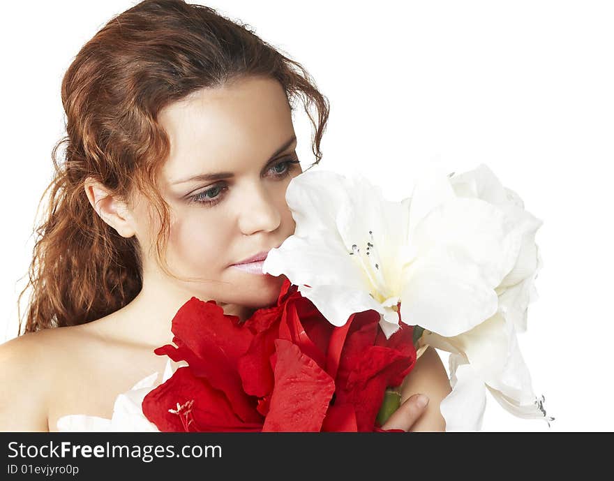 The attractive young girl with beautiful large flower. The attractive young girl with beautiful large flower