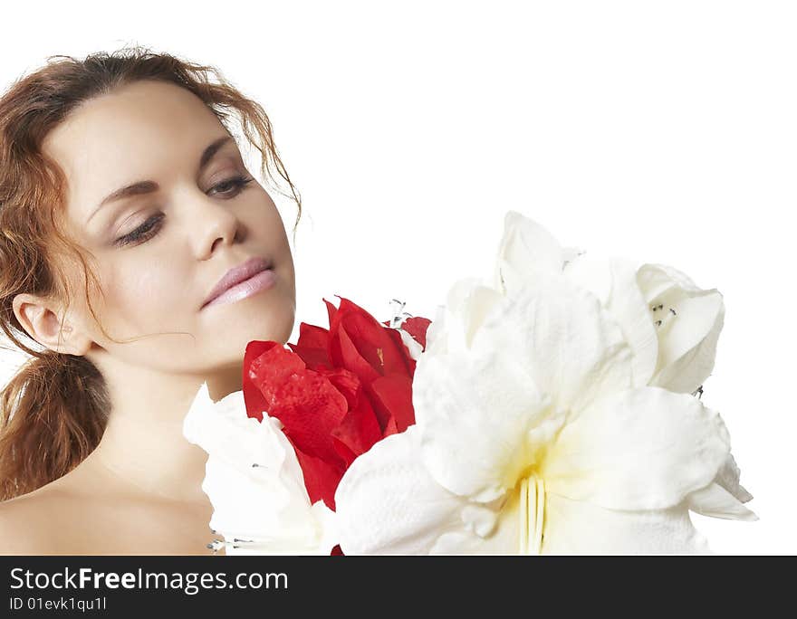 Beautiful girl smells flower