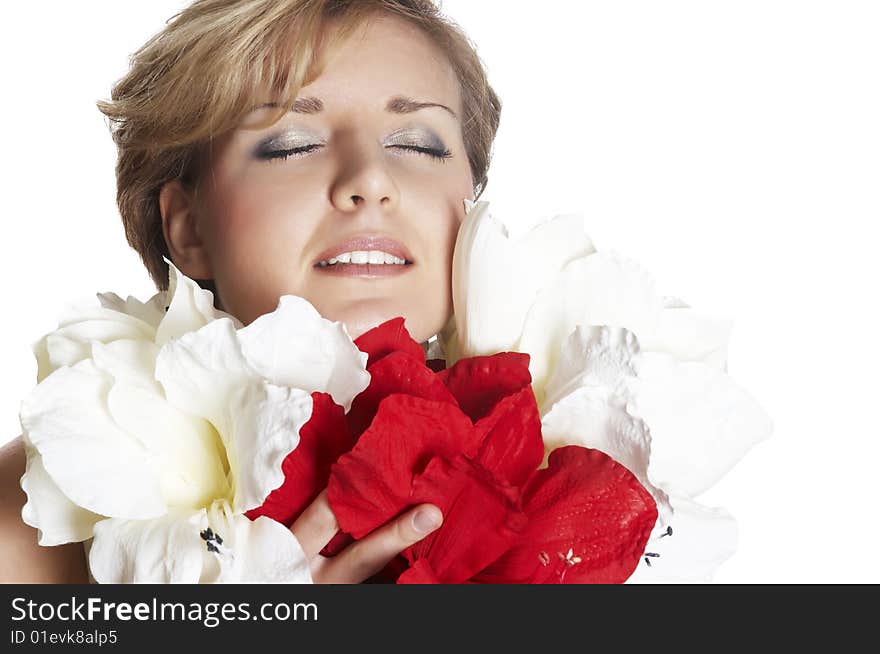 The attractive young girl with beautiful large flower. The attractive young girl with beautiful large flower