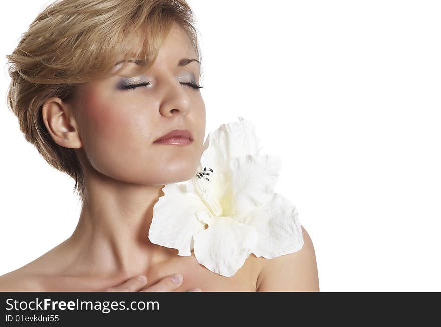 The attractive young girl with beautiful large flower. The attractive young girl with beautiful large flower