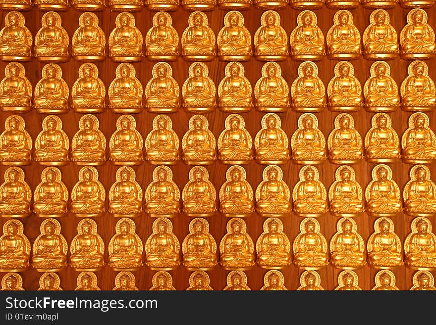 Thousand of Buddha images on the wall of pavilion in Chinese temple, Nonthaburi, Thailand. Thousand of Buddha images on the wall of pavilion in Chinese temple, Nonthaburi, Thailand.