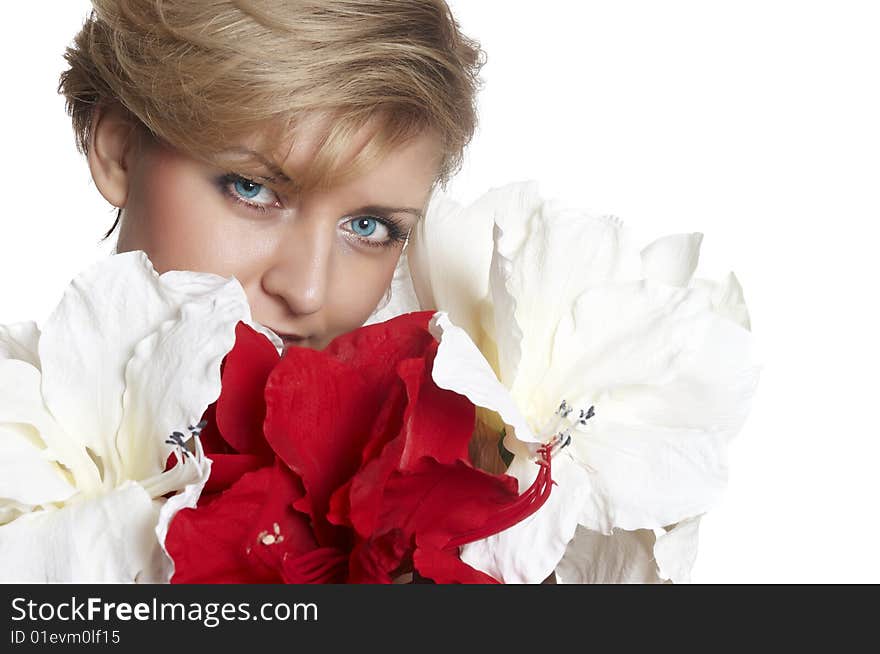 The attractive young girl with beautiful large flower. The attractive young girl with beautiful large flower