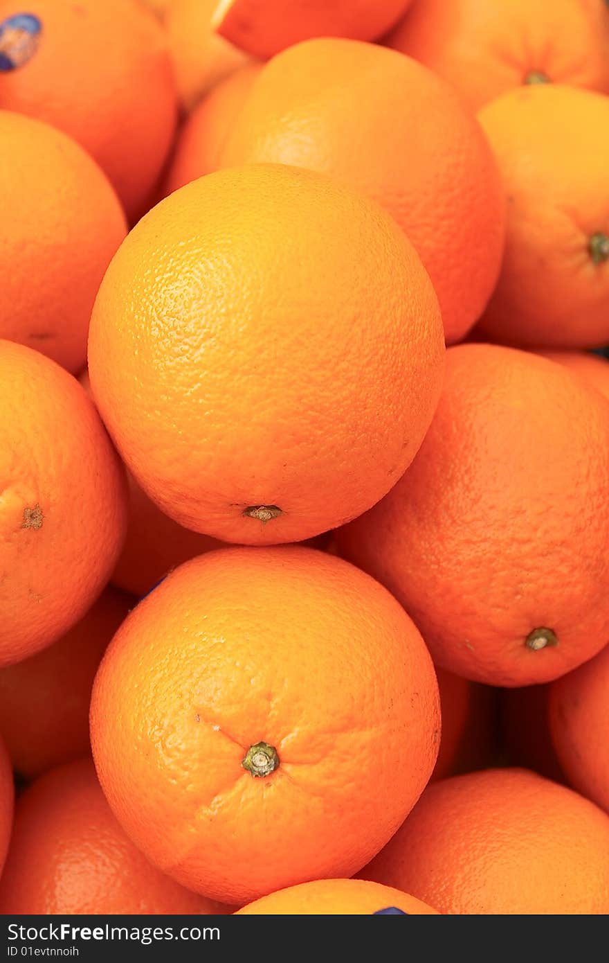 Fresh oranges with bright peel, sell on footpath in Yaowaraj road (Road of Gold), Bangkok, Thailand.