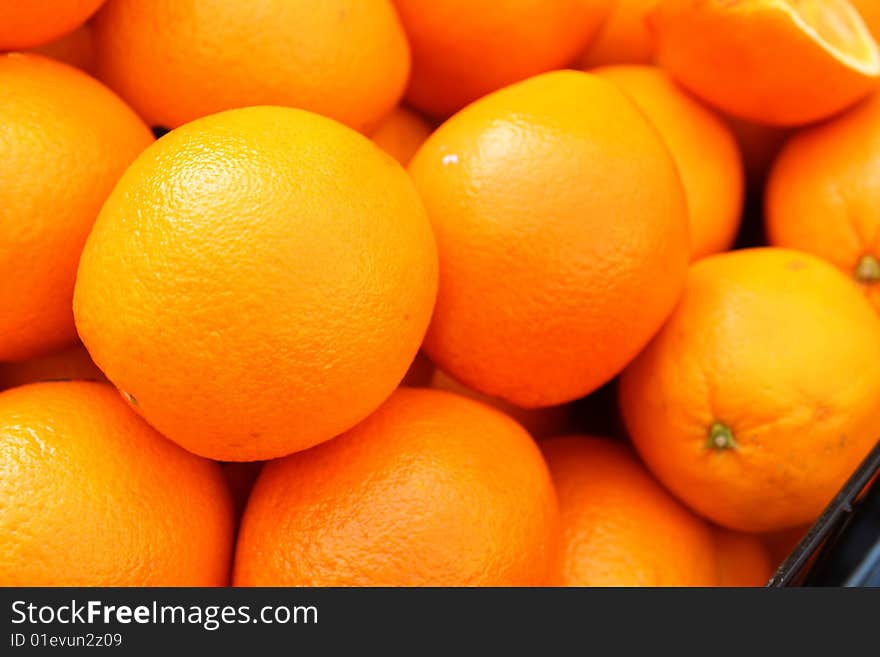 Fresh oranges with bright peel, sell on footpath in Yaowaraj road (Road of Gold), Bangkok, Thailand.