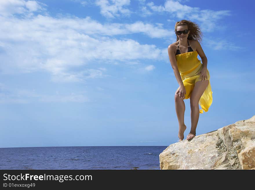 Girl On A Stone