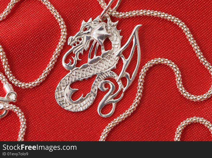 Silver necklace - a dragon.