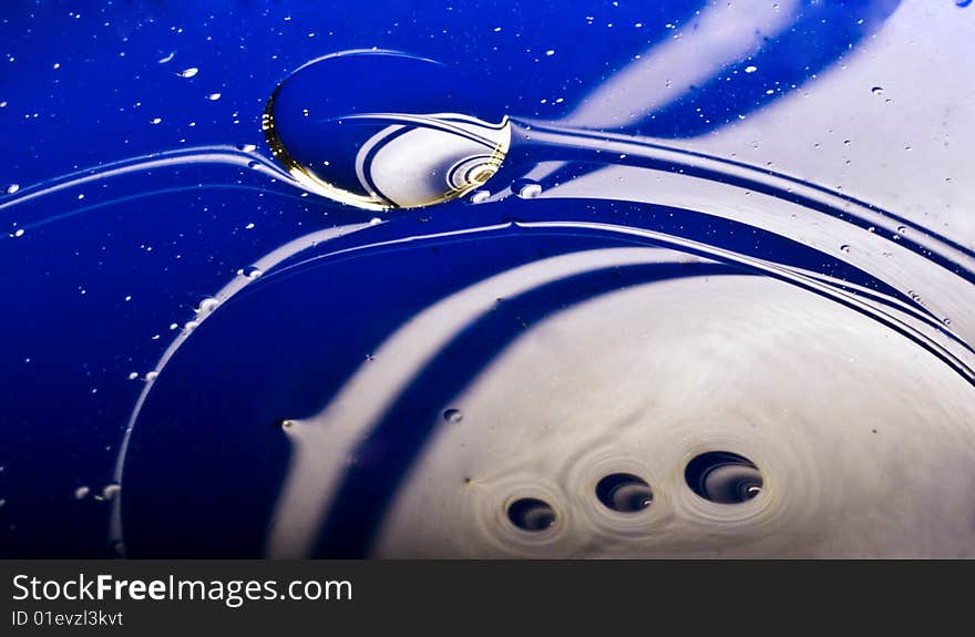 Abstract picture of liquid on coloured background. Abstract picture of liquid on coloured background