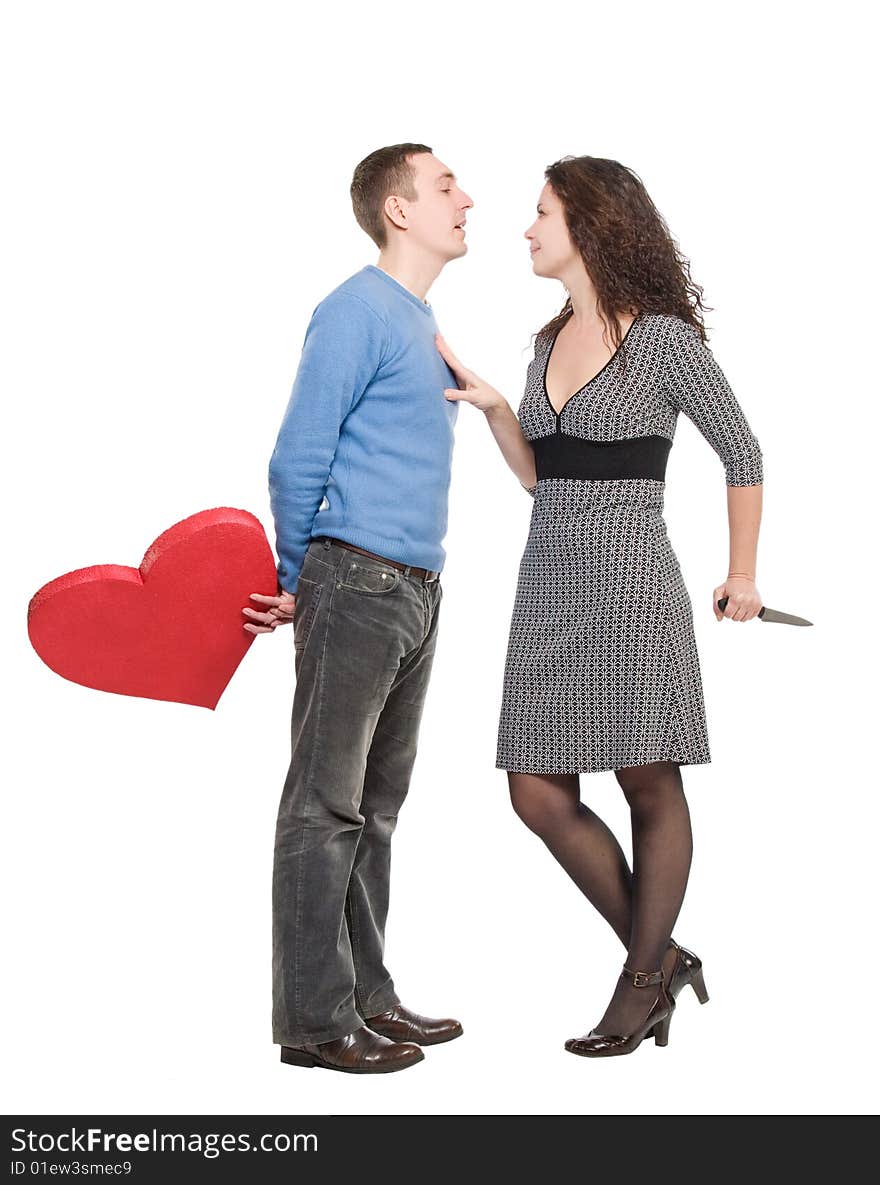 Couple wiht red heart and knife over white background