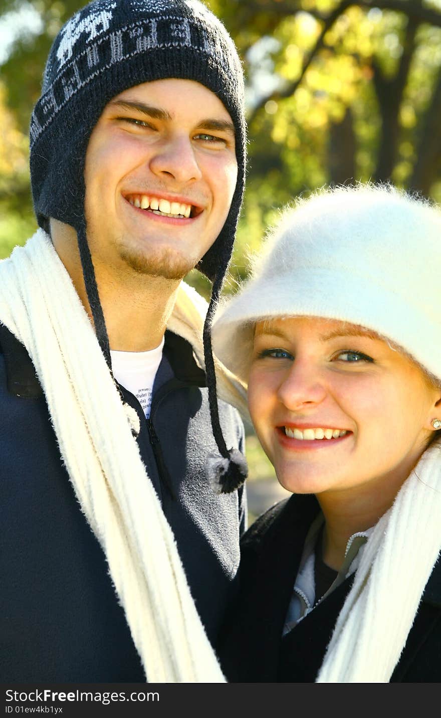 Happy young couple in urban lifestyle enjoying park environment. Happy young couple in urban lifestyle enjoying park environment