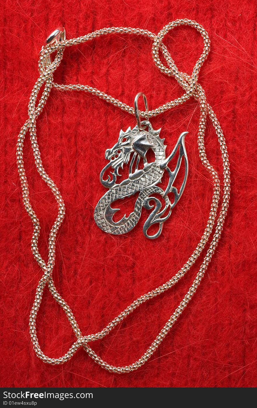 Silver necklace - a dragon.