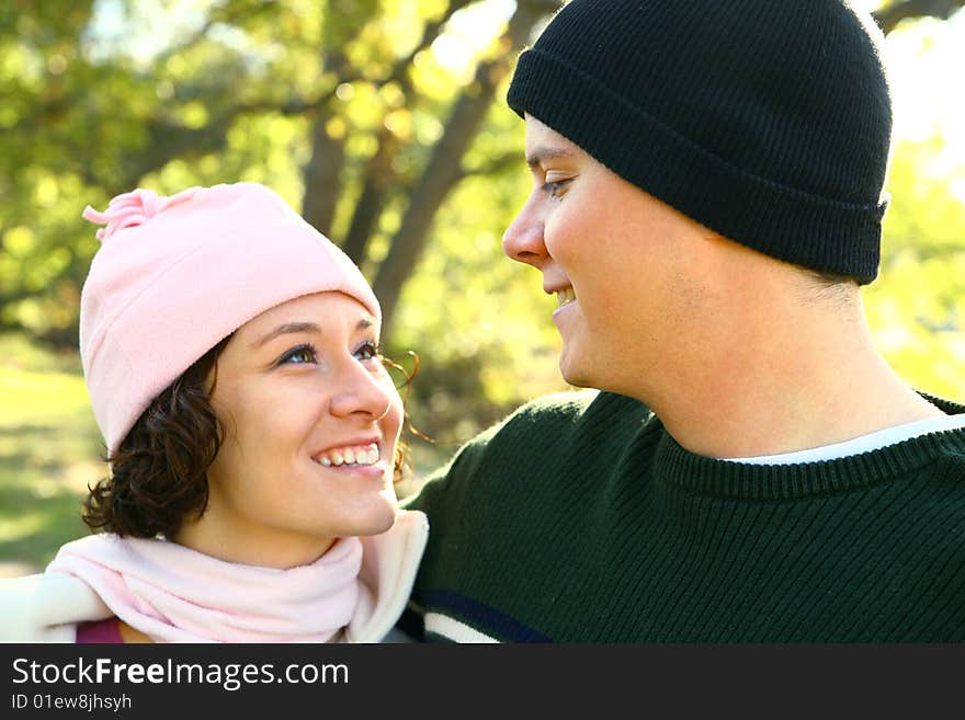 Young Happy Couple Looking At Each Other