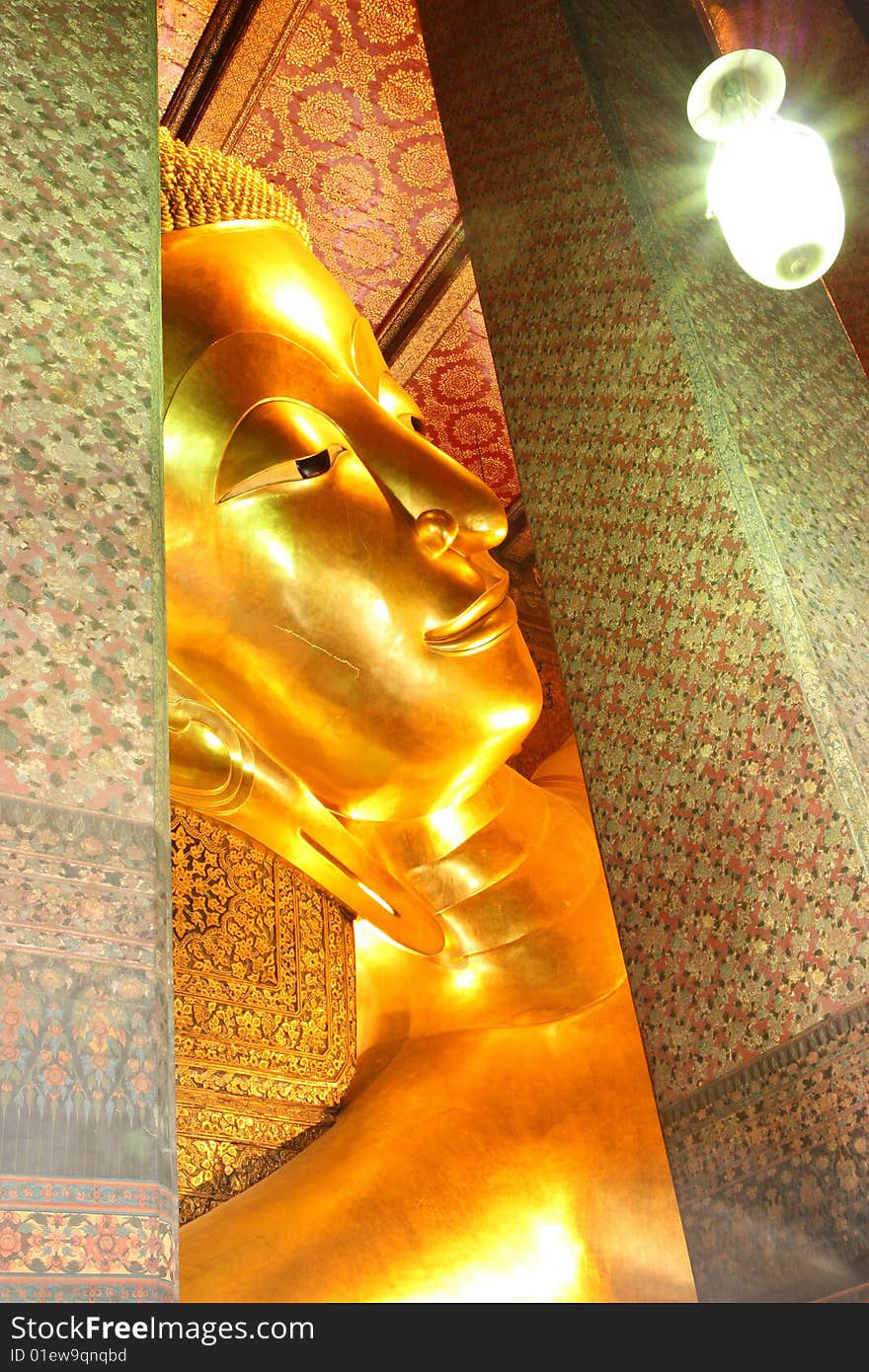 One of the most famous Buddha image in Thailand. The reclining Buddha of Wat Pho, Bangkok, Thailand. One of the most famous Buddha image in Thailand. The reclining Buddha of Wat Pho, Bangkok, Thailand.