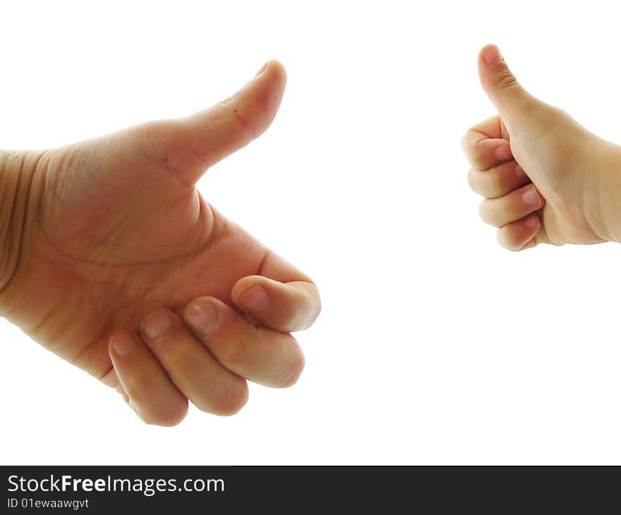 Two hands of a child and another of a man