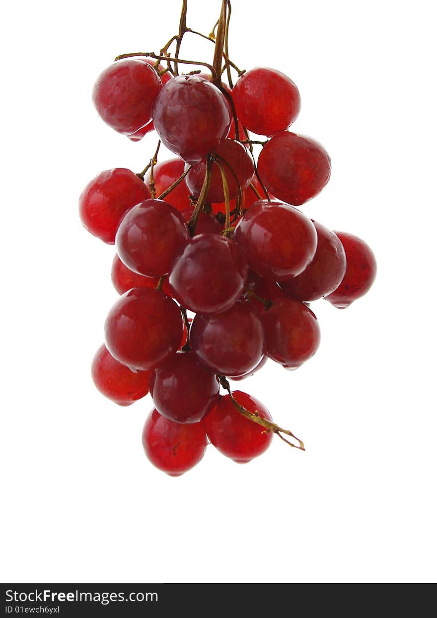 A bunch of red grapes isolated on white background