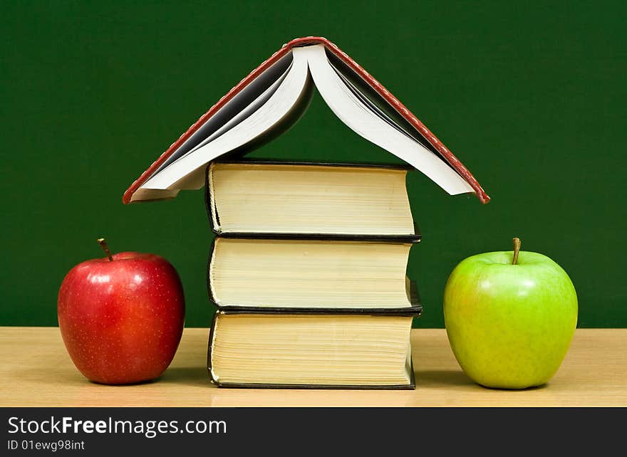 Cottage from books and apples