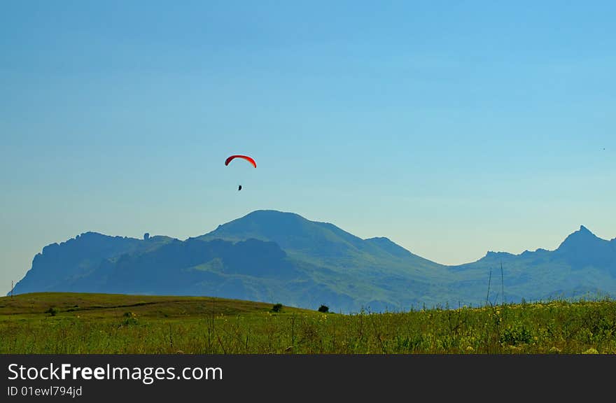 Landscape with parachuter