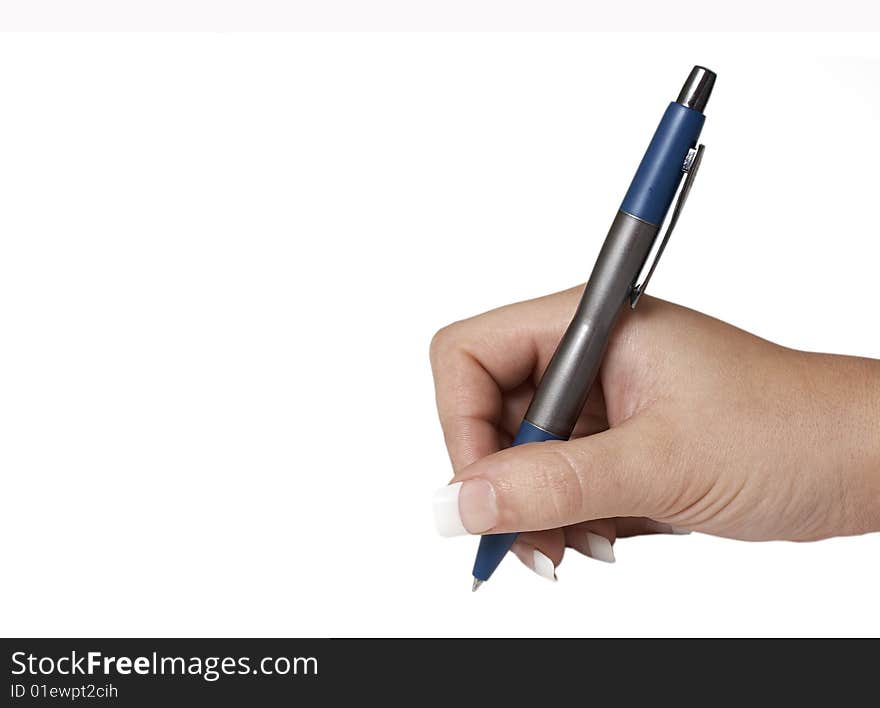 A macro picture of a female hand holding a pen. A macro picture of a female hand holding a pen