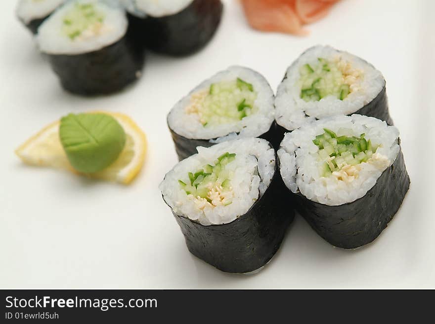 Traditional the Japanese meal sushi on a white background