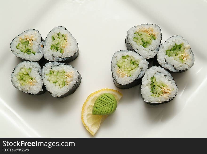 Traditional the Japanese meal sushi on a white background