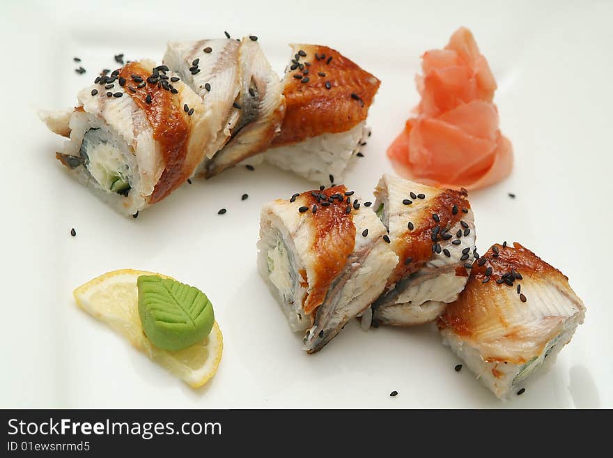 Traditional the Japanese meal sushi on a white background