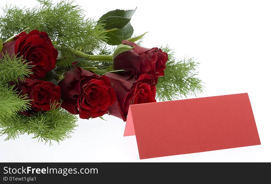 Red roses with a red place card