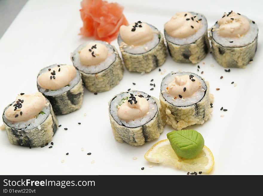 Traditional the Japanese meal sushi on a white background