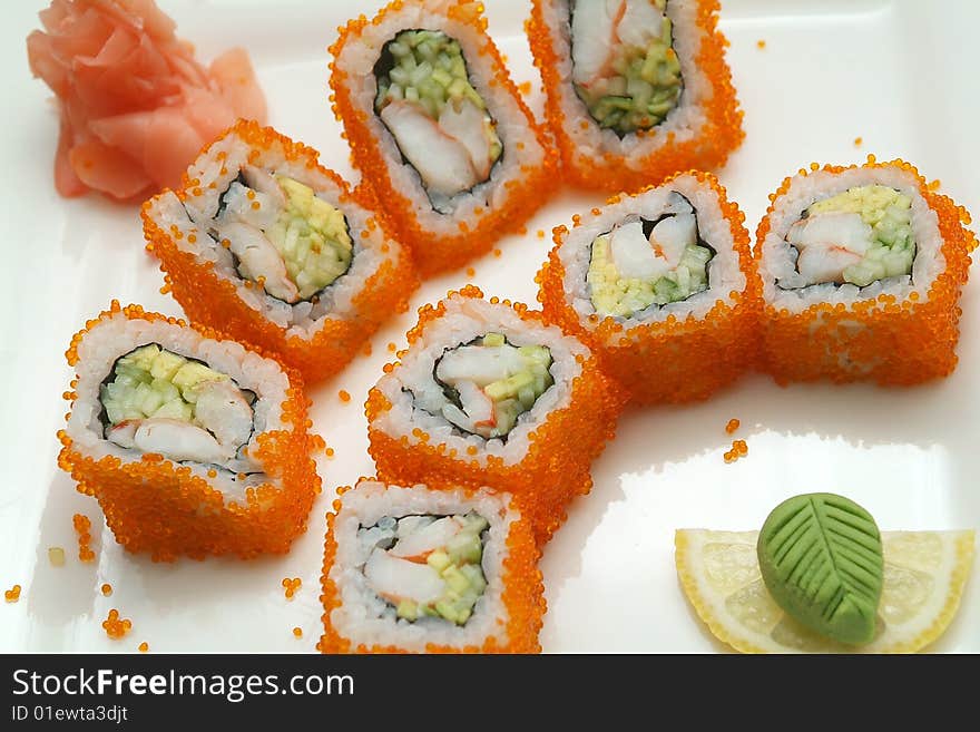 Traditional the Japanese meal sushi on a white background