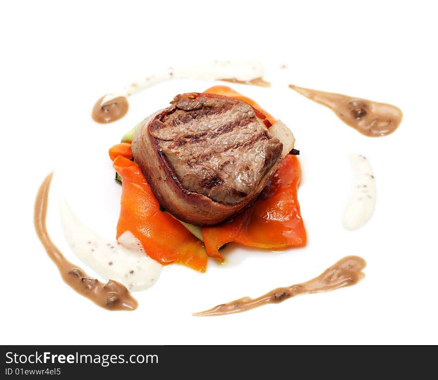 Beef Wrap with Vegetables and Sauce over White Background